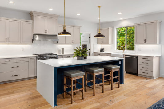 wood look flooring with quartz countertop in modern kitchen | Erskine | Twin Cities